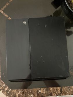PlayStation 4 with controller