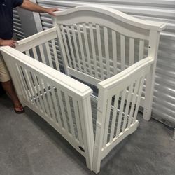 White Solid wood baby crib.  Have complete set of instructions to put together.. Bonavita brand $100