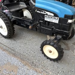 ERTL NEW HOLLAND  LP Tractor In Good Shape 