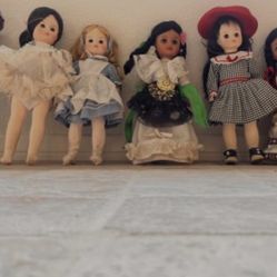 About 10 Different Madame Alexander Dolls