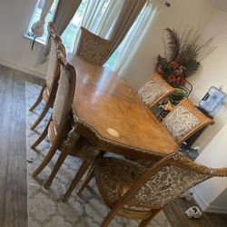 Dining Table + 6 Chairs + Floral Arrangements + Rug