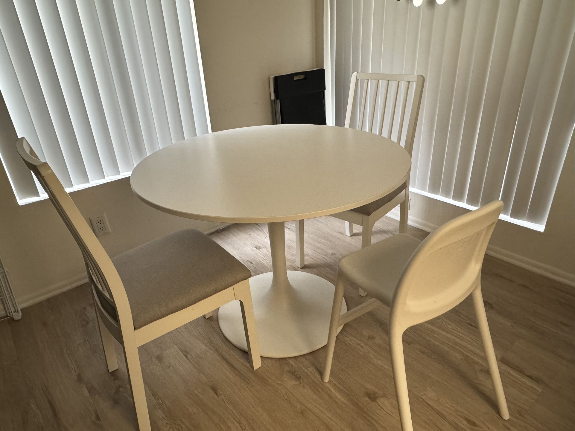 IKEA dining table and two dining chairs