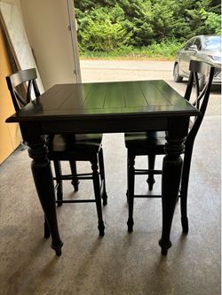 Cafe table set with 2 bar stools