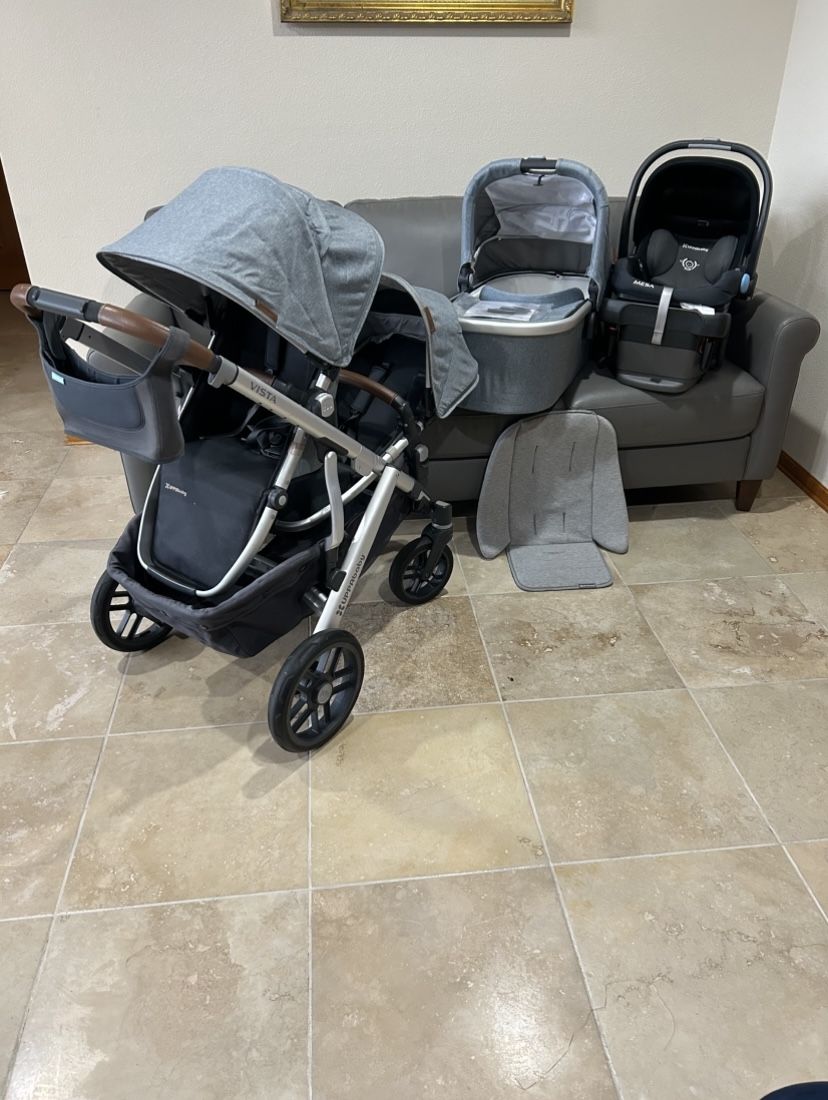 Uppababy Vista V2 Double Stroller with car seat and bassinet light blue