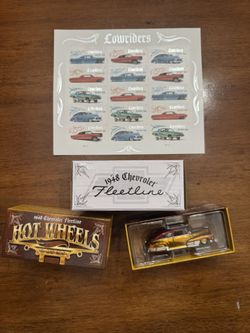Hot Wheels RLC 1948 Chevrolet Fleetline gold color new in box and includes Limited edition Lowrider USPS stamps.