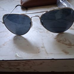 RAY BAN AVIATORS w/ BLUE TINTED LENSES AND POLISHED SILVER FRAME. BRAND NEW. $100 or BEST OFFER. 