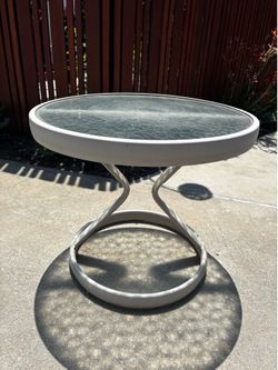 Outdoor glass top table for patio or pool