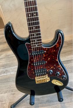 Strat Style Electric Guitar - Black w/ Brown Tortoiseshell