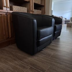 2 Black Leather Swivel Chairs