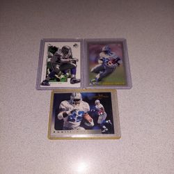 THREE HALL OF FAME EMMITT SMITH FOOTBALL CARDS IN PLASTIC 