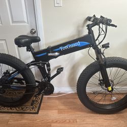 Bicicleta Electrica “ TotGuard “ En Excelente Condición. Size Large Incluye Cargador Y Llaves De La Batería 