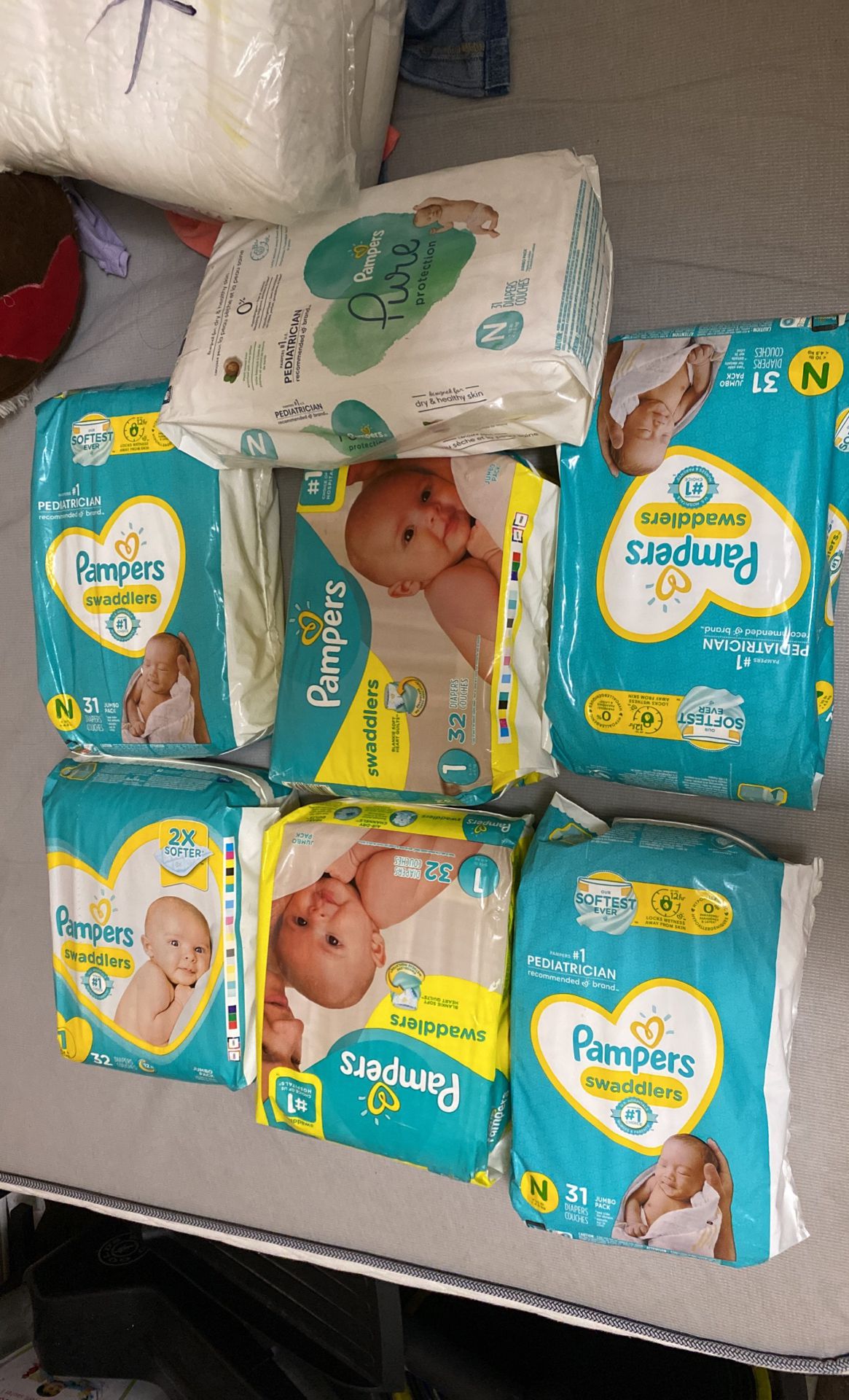 Newborn and Size 1 Pampers 