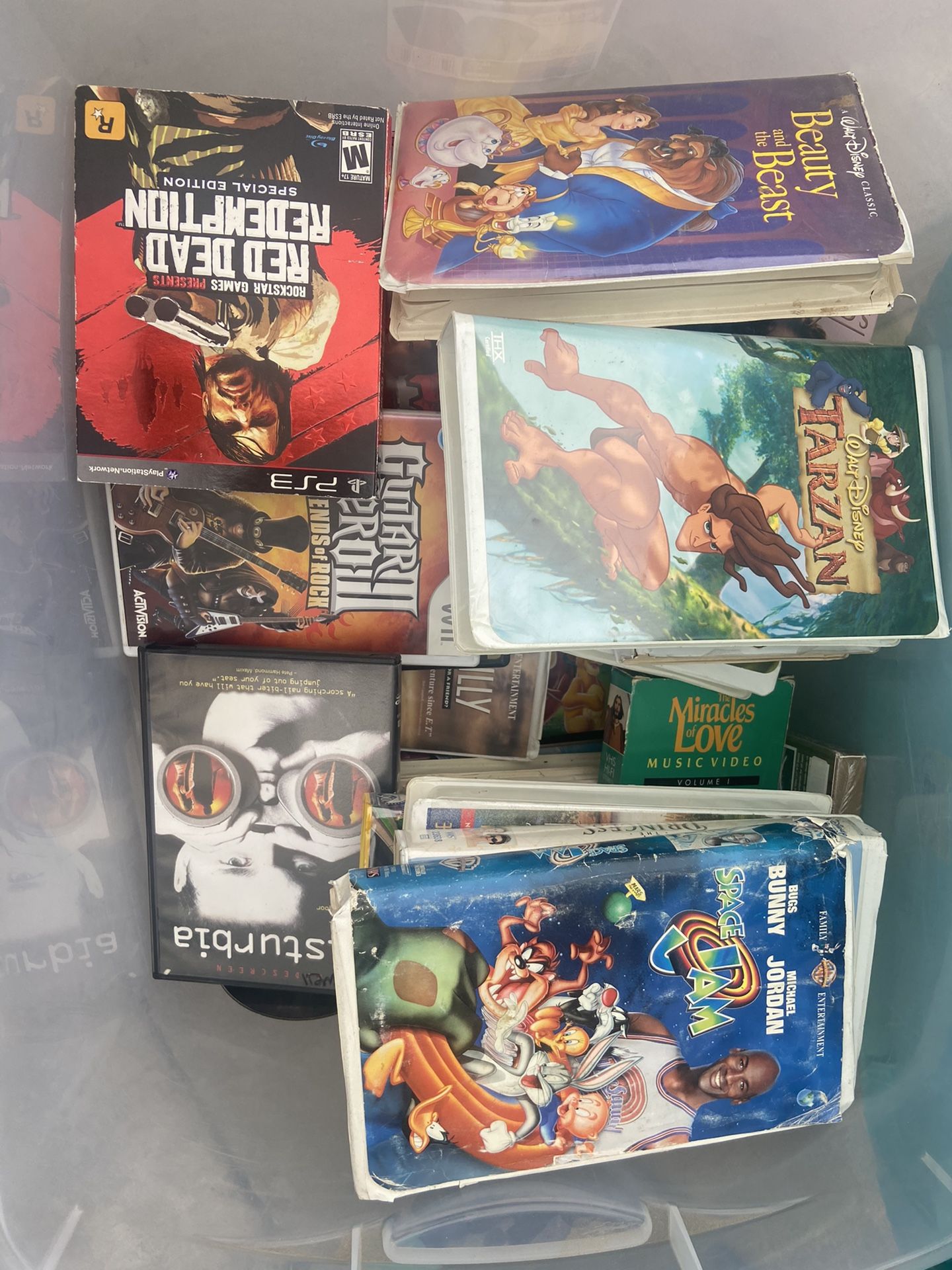 VHS tapes, DVDs, Blu-ray, PlayStation games rock band games