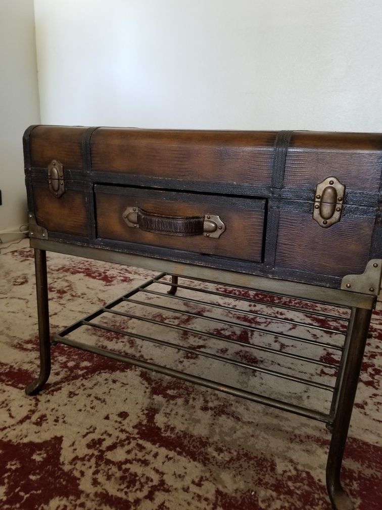 Old leather suitcase end table with metal stand