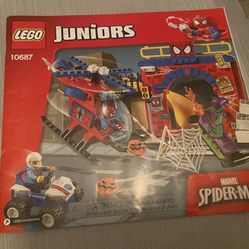 Lego instruction manuals for the Lego builds “Spider-Man Hideout, Snake Showdown, Comanche Camp, Airjitzu Zane Flyer” (70742, 10722, 79107, 10687)