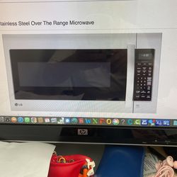 . Brand New In The Box . LG Stainless Steel Microwave.