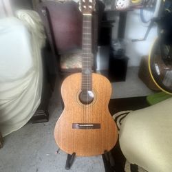 Guitar With A Stand 
