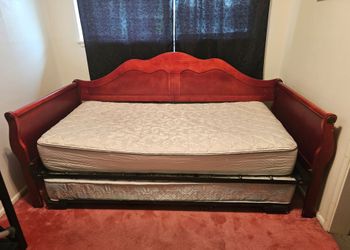 Twin size day bed with bonus pull out mattress