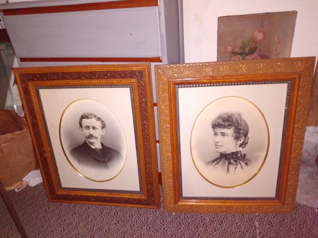 2 beautiful picture frames they're good  cality 27" by 23"