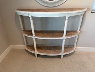 Curved entry table
