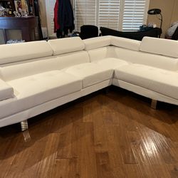 New Reclining Sectional With Adjustable Headrests .  White Leather .  106” X 77”.  Free Delivery !