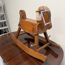 Handcrafted wooden rocking horse