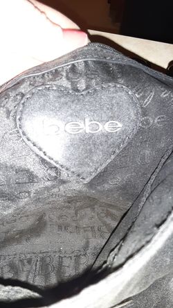 Brand new Bebe like clutch purse with locking tab