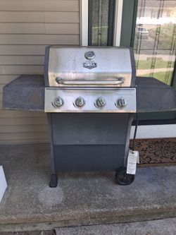 Grill and propane tank