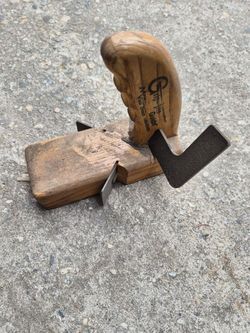 Grip-lite Guide made by Mesa Vista Design, which functions as a specialized woodworking tool for guiding saws or routers securely along a straight edg