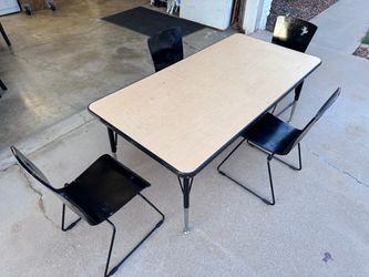 Kids tables and chairs set.