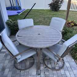 Hampton Bay Patio Table And Swivel Chairs