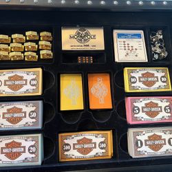 Franklin mint collector Harley Davidson monopoly game. Missing one corner, doesn’t affect play. Otherwise it has all original pieces and instructions