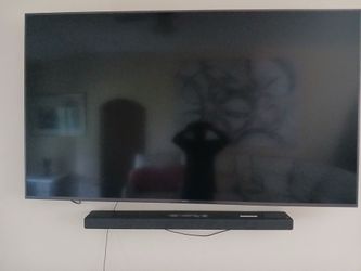 Large Flat Screen TV with Soundbar 85 inch