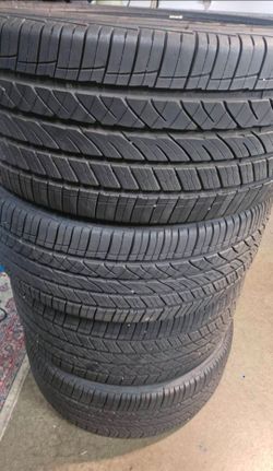 Four nice  staggered 18 inch Cooper tires
