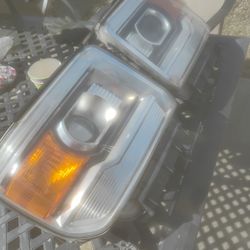 Headlights 2014 GMC Sierra 