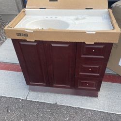 36.5 in. W x 18.75 in. D x 34.375 in ** Home Decorators Collection Sedgewood Single Sink Bath Vanity in Dark Cognac with Arctic Solid Surface Top