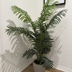 Faux potted palm tree 