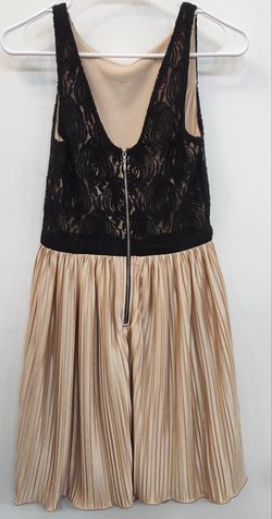 Rewind black lace and gold pleated dress. Small