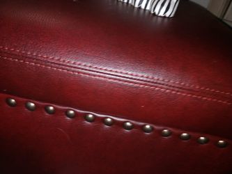 Pier 1 beautiful ottoman. Deep rich burgundy color.