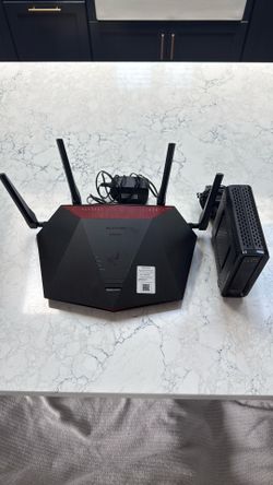 Netgear Nighthawk XR 1000 Pro Gaming Router & Arris Surfboard SB6141