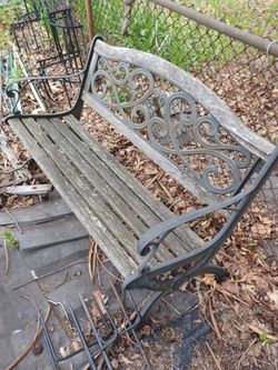 Three cast iron benches