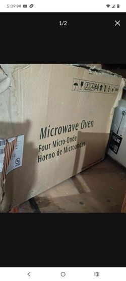 New microwave white Frigidaire new