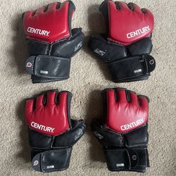 2x pairs sparring/ grappling, mma gloves. Lightly used. $20