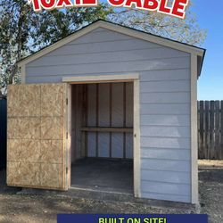 10 x 12 GABLE  INCLUDES :1door, 2 Free  shelves