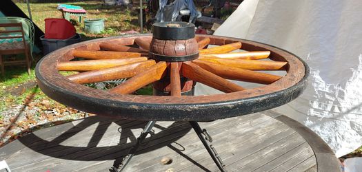 Antique wagon wheel table