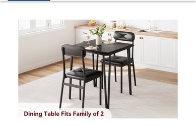 Garvee table & 2 chairs  unopened box