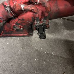 Cummins ISX engine intake manifold with an EGR pipe