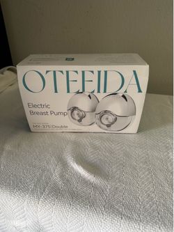 Brand new breast pump