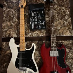 Peavey electric & Epiphone bass guitar