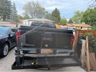 Hitch rack with lift
